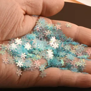 Lentejuelas de copo de nieve azul iridiscente 7mm para manualidades y decoración.
