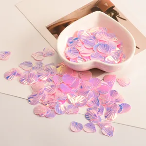 Iridescent pink seashell sequins for DIY crafts, sparkling shell glitters for garment decoration.