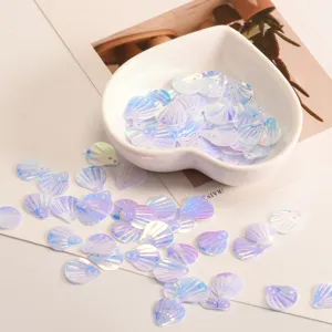 Iridescent shell sequins for DIY crafts, sparkling clothing accessories with holes.