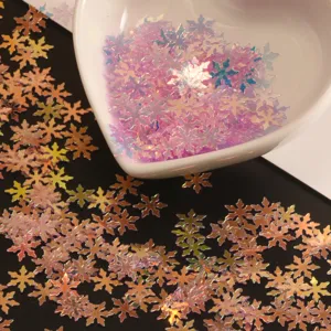 Paillettes flocon de neige iridescentes pour nail art et décoration de résine époxy.