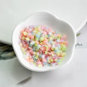 Luminous polymer clay star slices, cute DIY resin filler and craft embellishment details.