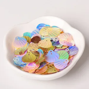 Iridescent shell sequins for DIY crafts, colorful fish scale paillettes for clothing decoration.