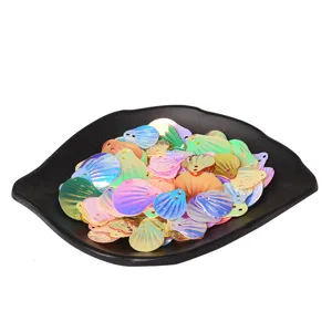 Colorful shell shaped sequins for DIY crafts and garment decoration, shiny iridescent trim.