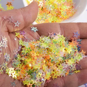 Hollow star nail sequins detail view, iridescent glitter flakes for DIY manicure art design.