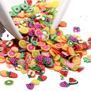 Rodajas de fruta de arcilla polimérica de colores para nail art, manualidades y resina.