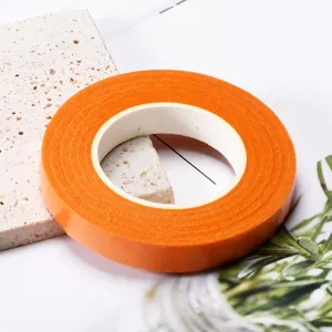 Floral paper tape detail shot, orange 1.2cm DIY craft floral stem wrapping tape material.