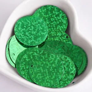 Detail view green holographic round sequins for DIY sewing crafts 25mm garment trimmings