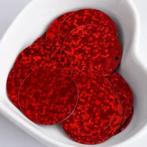 Red holographic round sequins detail shot, 25mm DIY garment accessory craft trim.