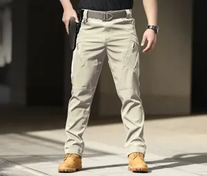 Detailed view of the khaki tactical cargo pants featuring multi-pockets and durable fabric.