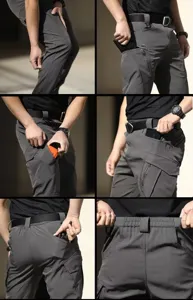 Detailed view of men tactical cargo pants showcasing multiple functional pockets and elastic waist.