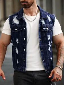 Close-up detail shot of distressed blue denim vest featuring ripped design and metal buttons.