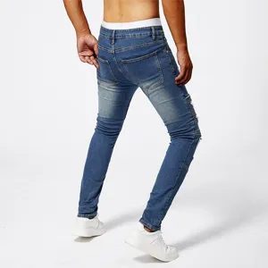 Men's slim fit distressed blue jeans casual stretch denim pants with ripped details back view.