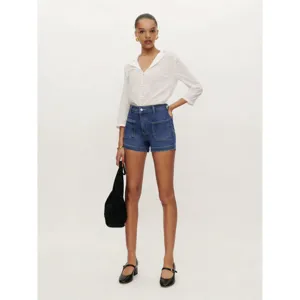 Shorts in denim elasticizzato casual da donna con tasche anteriori estate blu abbigliamento vista