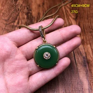 Vintage retro style green stone inlaid rhinestone copper chain pendant necklace for women.