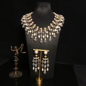 Vintage style crystal glass pearl fringe necklace and earrings detail view showing craftsmanship.