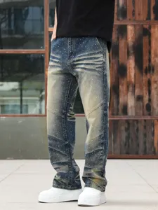 Men's loose straight leg denim jeans with heavy wash and hot fix rhinestones streetwear style.