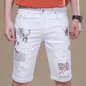 Men's white denim shorts with ripped details and casual graffiti print for summer fashion.