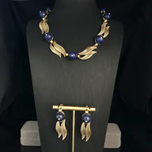 Vintage blue bead necklace earrings set detailed view showing exquisite retro metal leaf design.