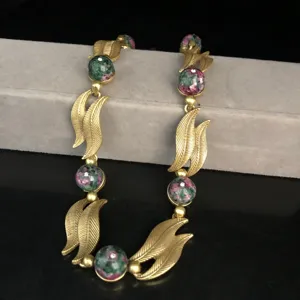 Vintage style metal leaf gemstone bead necklace detail view for women elegant jewelry