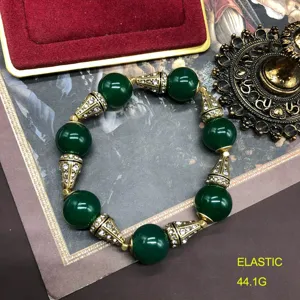Vintage style green beaded stretch bracelet with rhinestone gold spacer beads for women