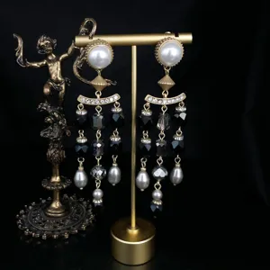 Vintage retro baroque style pearl crystal tassel earrings, exquisite detail jewelry display.