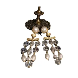 Vintage baroque style multi-strand pearl crystal drop earrings, elegant gold-tone metal fashion jewelry for women.