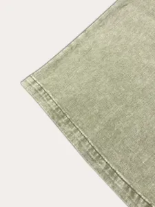 Lichtgroene niet-elastische denim jas stofdetail voor heren met fijne stiksels.