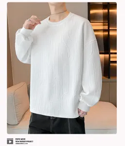 Mens casual white crewneck sweatshirt with embossed letter texture and long sleeves.