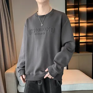 Men's heavy crewneck sweatshirt featuring stylish embossed letter design for casual autumn wear.