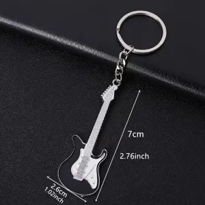 Metal guitar keychain close-up view, stylish music pendant accessory with detailed black finish.