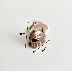 Vintage metal Roman soldier helmet keychain, bronze distressed 3D bag pendant charm.