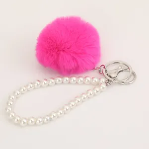Pink fluffy pom pom pearl bracelet keychain, cute plush bag charm and car hanging pendant.