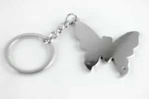 Metal butterfly keychain with keyring, creative animal bag charm and stylish accessory.