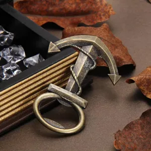 Close up detail shot of vintage bronze anchor beer bottle opener with nice rope details