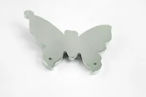 Metal butterfly keychain pendant detail view, silver tone charm for DIY crafts and accessories.
