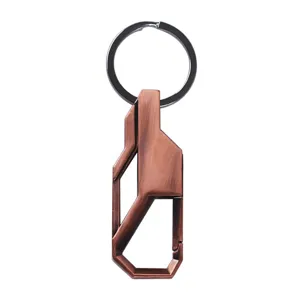 Bronze metal car keychain detail view, geometric carabiner keyring for daily keys gift.