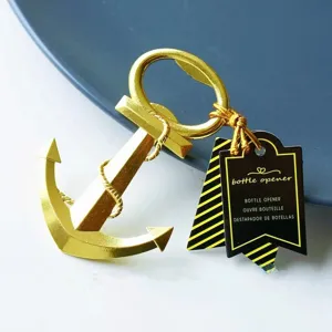 Close-up detail of the creative gold anchor bottle opener featuring a delicate hang tag.