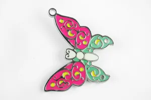 Metal enamel butterfly pendant detail, creative DIY jewelry and keychain accessory.
