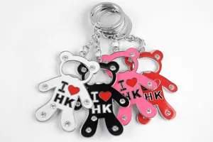 Porte-clés ours en métal créatif avec strass et fonction décapsuleur en plusieurs couleurs.