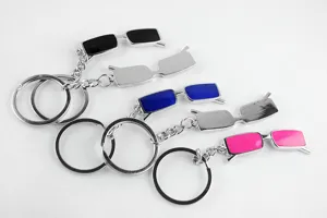 Creative metal sunglasses keychain detail view, showing multiple colorful miniature glasses pendants.