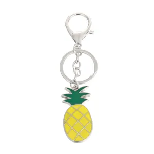 Cute metal pineapple keychain with enamel finish, trendy bag charm and car key ring accessory.
