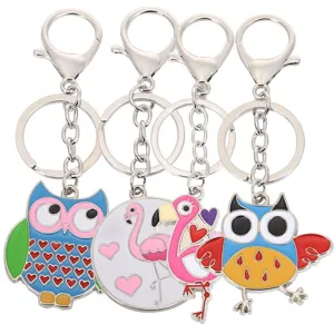 Leuke metalen sleutelhanger set met kleurrijke uil en flamingo hangers voor je sleutels.