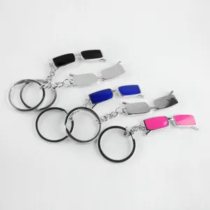 Creative metal sunglasses keychain set with colorful miniature glasses pendant for everyday use.