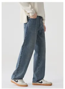 Jeans dritti larghi blu scuro lavati per uomo e donna in stile vintage americano.