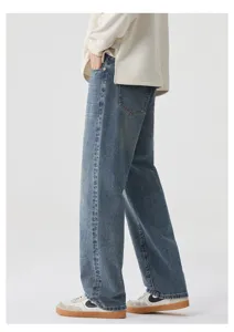 Jeans in denim larghi e dritti lavati rétro per uomo e donna, in stile streetwear vintage.