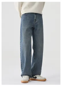 Jeans larghi dritti vintage streetwear dettaglio, lavaggio blu di alta qualità.