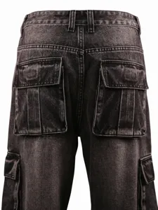 Detail view of men's dark grey cargo jeans featuring multi pockets and utility back pocket stitching.