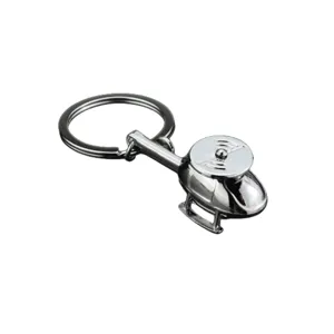 Detailed view of a creative metal helicopter keychain with polished silver finish keyring.