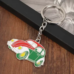 Creative metal car keychain pendant, classic beetle car shape, stylish key ring accessory.