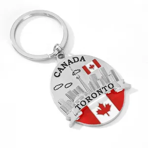 Metal Toronto Canada souvenir keychain detail shot showing CN tower and flag design pendant.